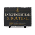 Slate Desk Plaque — "Execution Reveals Structure"