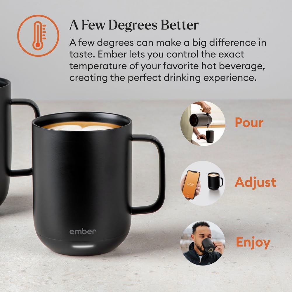  A matte black Ember Smart Mug 2 with a glowing white LED indicator at the base, sitting on a neutral grey surface. Features the Bold Leadership Path logo.