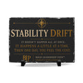 Decorative sign with text and compass design on a black background